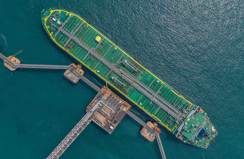 This aerial photo shows a tanker unloading imported crude oil at a terminal port in Qingdao, in China's eastern Shandong province on June 25, 2026.