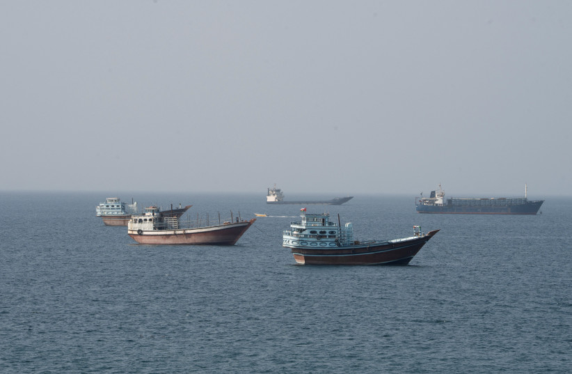 Vessels near the Strait of Hormuz, as seen from Musandam, Oman, August 17, 2026.