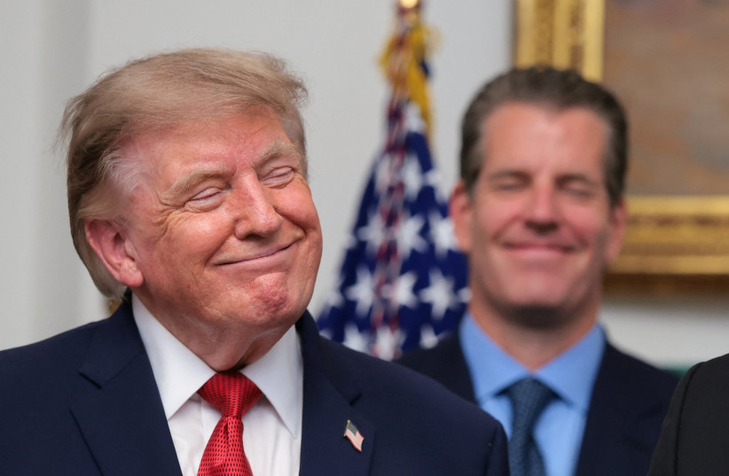 US President Donald Trump reacts during a press conference with cryptocurrency executives in the Roosevelt Room at the White House in Washington, DC, US, August 19, 2026.