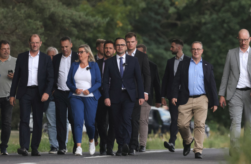Jan Redmann, Minister of the Interior and for Municipal Affairs of the State of Brandenburg, walks near the site after explosive devices have been found at a substation near the Jaenschwalde power plant in Turnow-Preilack, Germany, September 1, 2026.