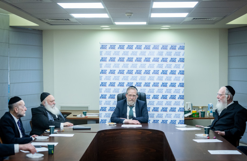 MK Yitzhak Pindrus and United Torah Judaism party members attend a party meeting at the Knesset, the Israeli parliament in Jerusalem, on March 3, 2025.