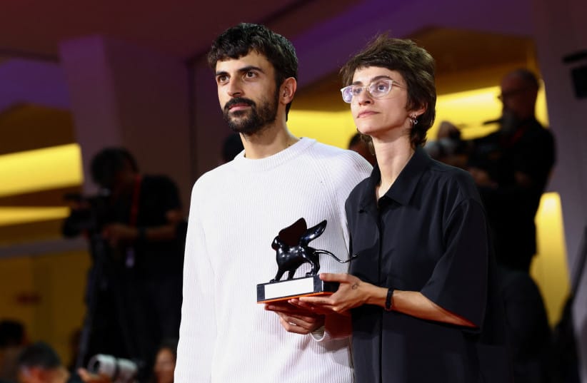 Directors Yuval Abraham and Rachel Szor pose with the Special Jury Award for ''Naza'' during the closing ceremony of the 83rd Venice International Film Festival, Italy, September 12, 2026.