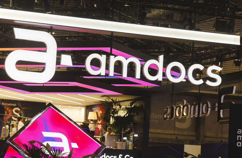 A logo sits illuminated at the Amdocs booth in Mobile World Congress 2026 on March 02, 2026 in Barcelona, Spain.