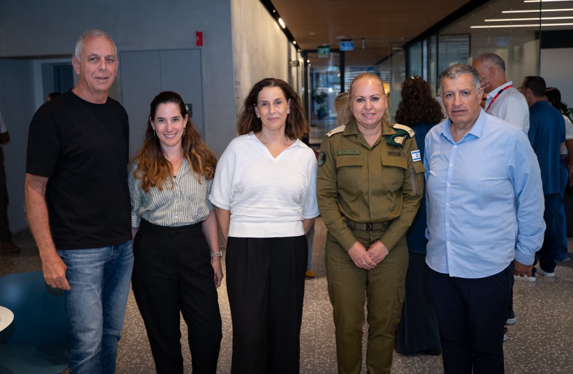 Mordechai (R) and his team at the Oz VeRuach initiative have been working to help wounded IDF veterans find employment in the hi-tech sector.
