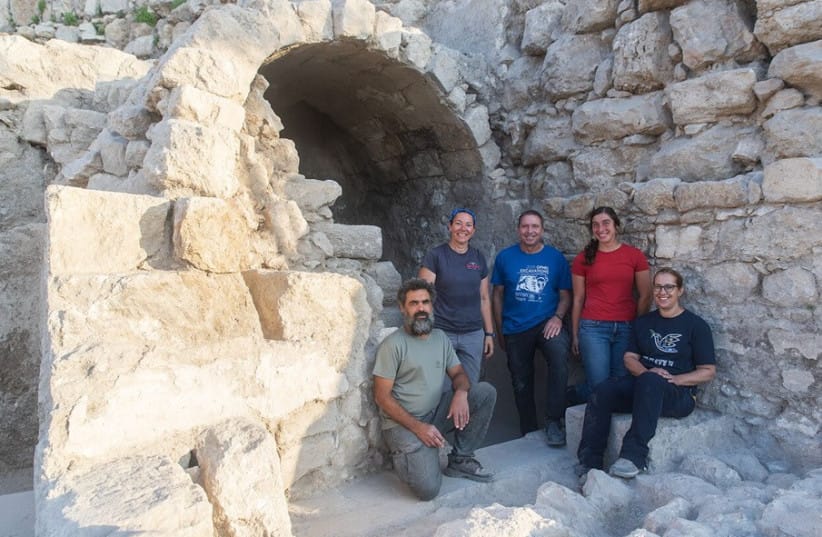 Members of the Hebrew University of Jerusalem's archaeology team standing in front of the vaulted mikvah, September 23, 2026.