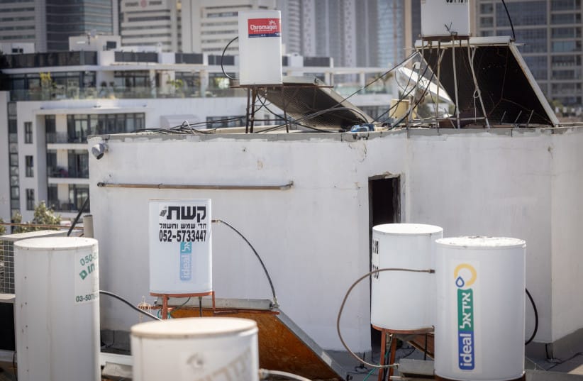 1. SOLAR WATER heaters on a Tel Aviv rooftop.