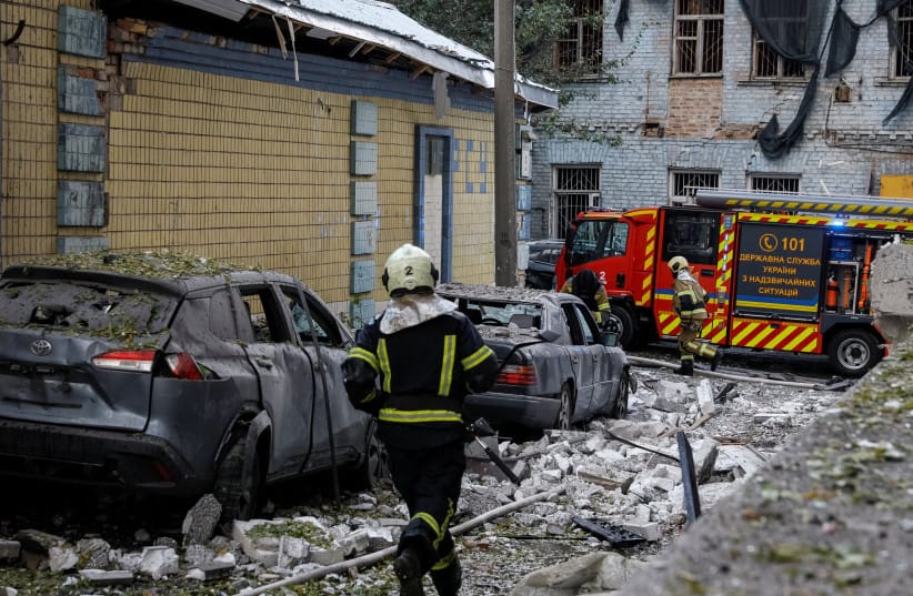 Firefighters run at the site of a Russian drone strike, amid Russia's attack on Ukraine, in Kyiv, Ukraine September 25, 2026.