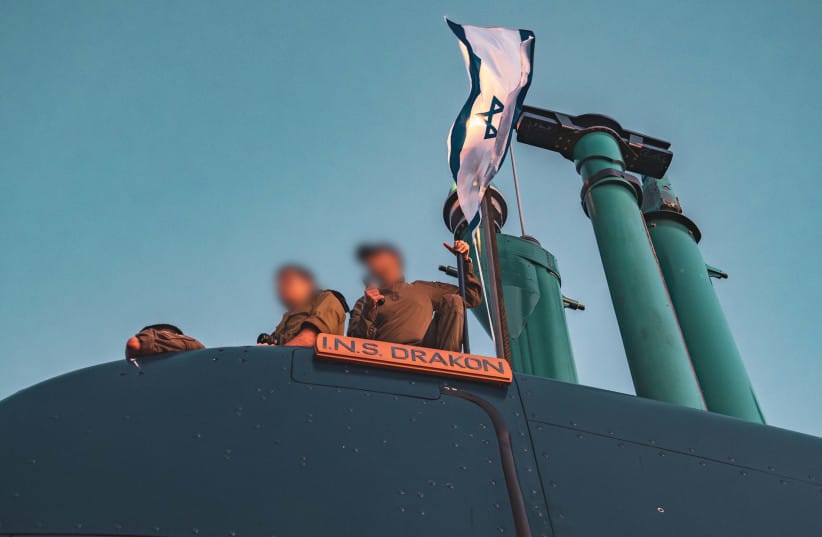 Soldiers stand aboard the INS Drakon in images released on September 24, 2026.