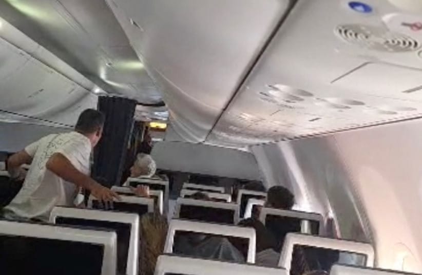 Flydubai passengers react and check after realising there is commotion in the cockpit Sunday, 4th October 2026