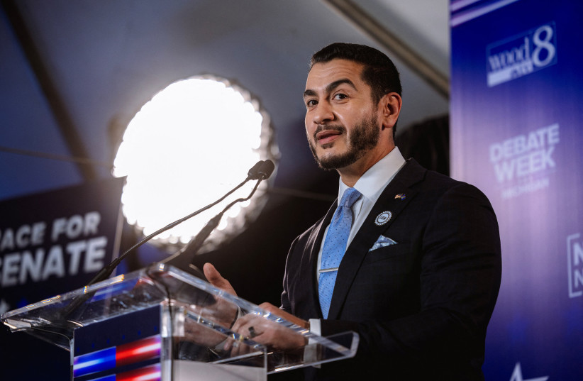 Democratic US Senate candidate Abdul El-Sayed speaks to the press in the spin room after taking part in a debate with Republican rival candidate Mike Rogers, in Grand Rapids, Michigan, US, October 8, 2026.