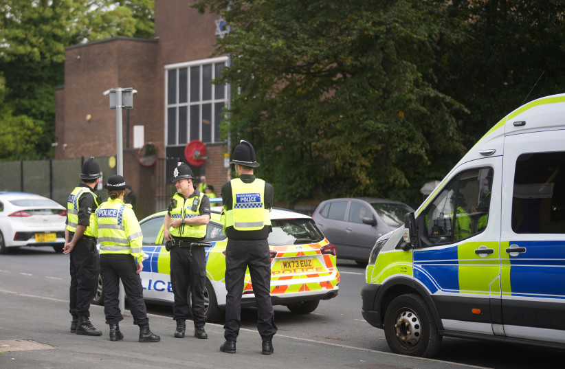 A Police presence outside Heaton Park Synagogue as members of the Jewish community mark Yom Kippur, on September 21, 2026 in Manchester, England;illustrative