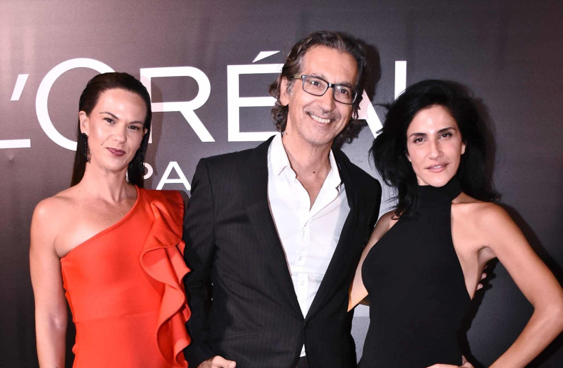 From right: Maggie Azarzar, Eli Sagiv and Netta Kretso Neiger at the L’Oréal Paris gala in Tel Aviv, October 13, 2026.