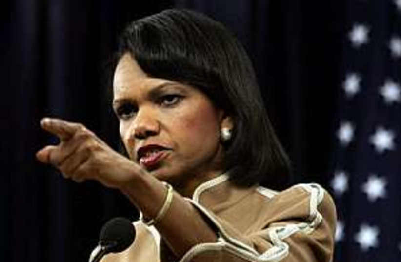condi rice pointing and  (photo credit: AP [file])