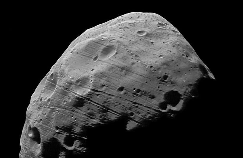 This handout image from ESA/NASA, obtained August 21, 2008 taken by the High Resolution Stereo Camera on board the ESA?s Mars Express shows the highest-resolution full-disc image yet of the surface of the moon Phobos.