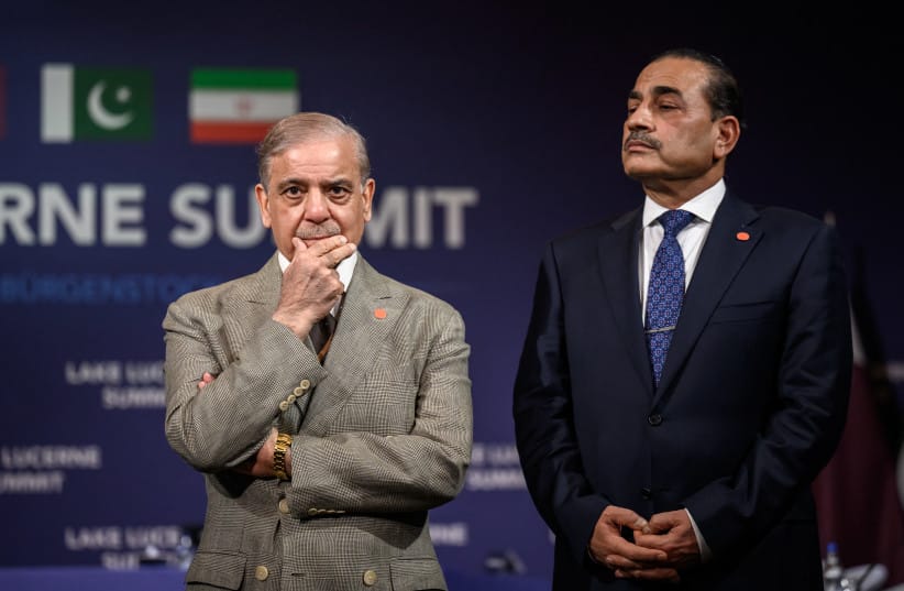 Pakistan's Prime Minister Muhammad Shehbaz Sharif (L) stands with Pakistan's Chief of Army Staff Field Marshal Asim Munir prior to a quadrilateral meeting between the United States, Iran, Pakistan and Qatar at the Burgenstock luxury hotel complex overlooking Lake Lucerne, Switzerland, on June 21.