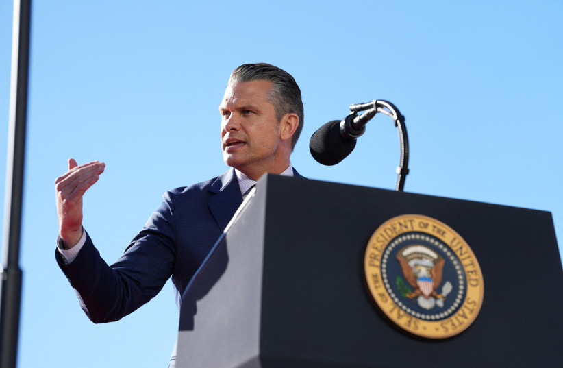 US Defense Secretary Pete Hegseth gestures as he speaks during an event at Sparrows Point Shipyard, in Baltimore County, Maryland, US, October 6, 2026.