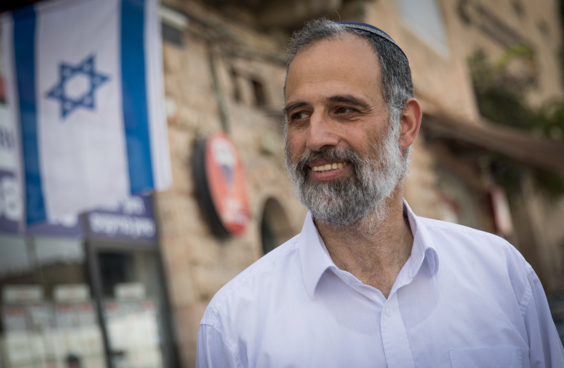 FILE PHOTO: Rabbi Yitzchak Chai Zaga stands outside a polling station during the party's preliminary elections, in Jerusalem, on April 27, 2017.