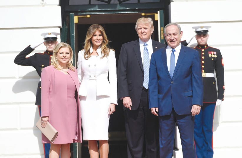 BEING WELCOMED, with wife Sara, by US President Donald Trump and First Lady Melania Trump upon arrival the White House in Washington, 2017.