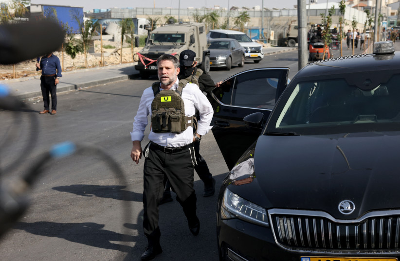 Israeli Finance Minister Bezalel Smotrich visits the scene of shooting attack near the West Bank city of Hebron, October 23, 2026.
