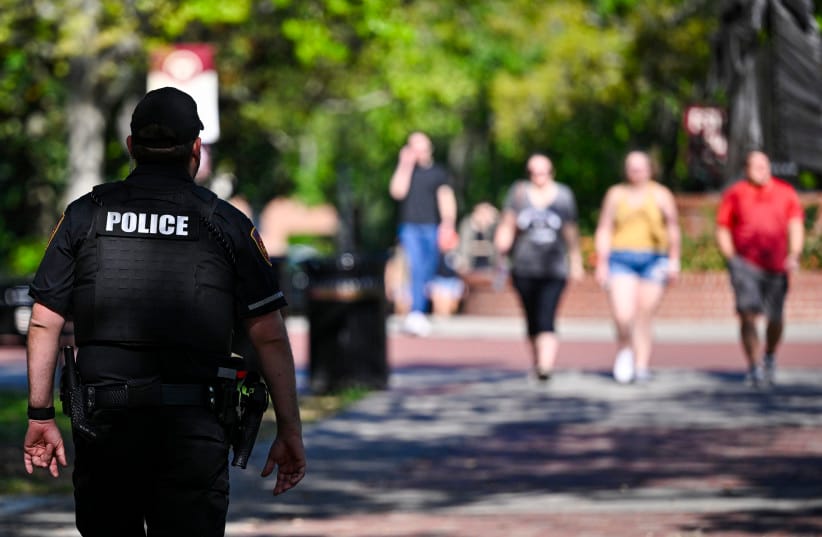 A Florida State University police officer stands watch near the scene of a shooting near the Florida State University student center on April 18, 2025 in Tallahassee, Florida; Illustrative.