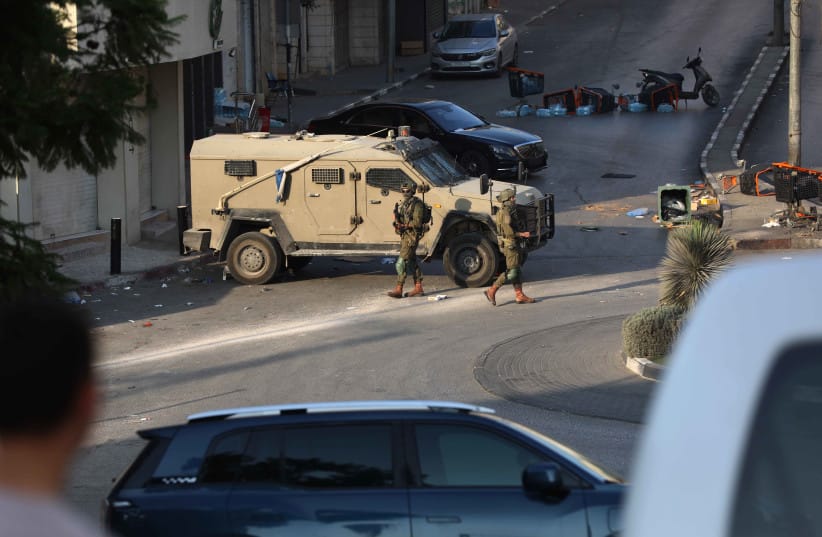 IDF soldiers take part in a military operation in the West Bank city of Hebron, October 25, 2026
