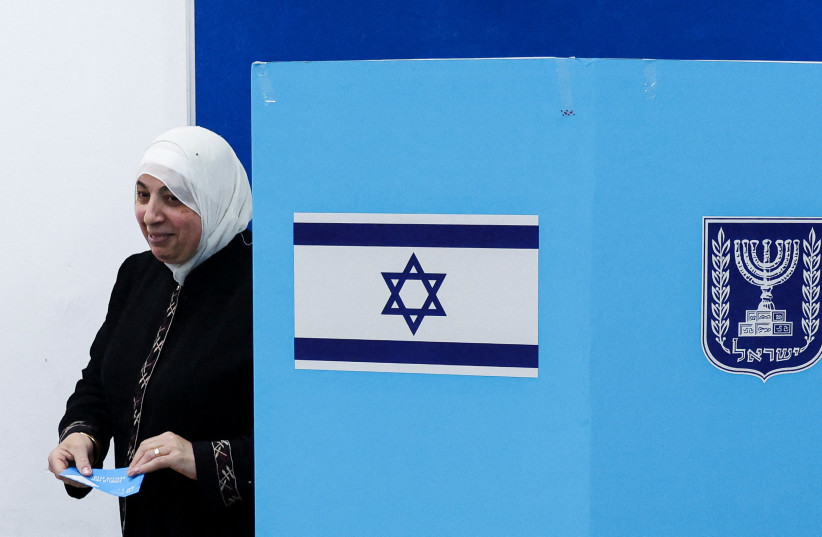 A woman votes during the national election in the Arab city of Umm al-Fahm, northern Israel, October 27, 2026
