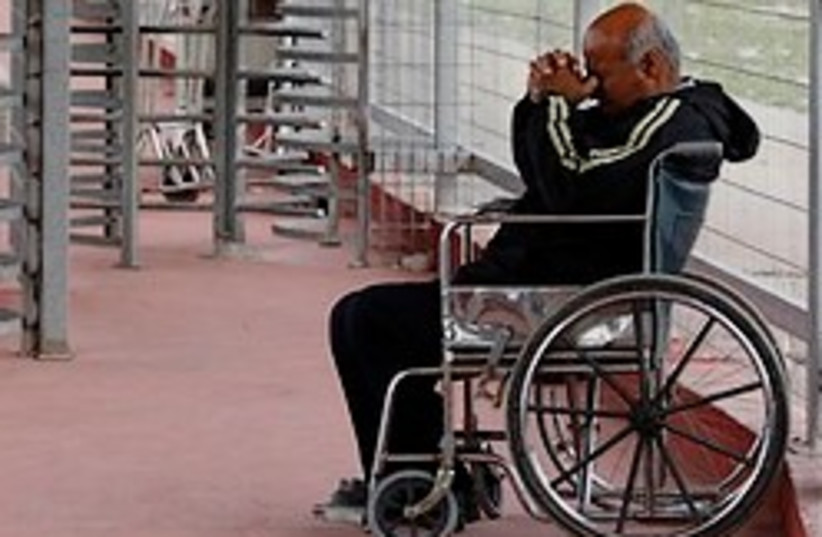 Gazan in wheel chair 248.88 (photo credit: )