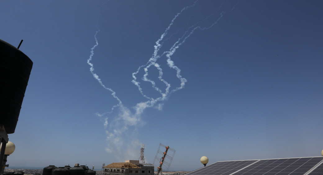 Trails of smoke are seen as rockets are fired from Gaza towards Israel, in the southern Gaza Strip, on May 10, 2023. (photo credit: ABED RAHIM KHATIB/FLASH90)