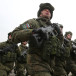 Russian soldiers march in Almaty, Kazakhstan, January 13, 2022