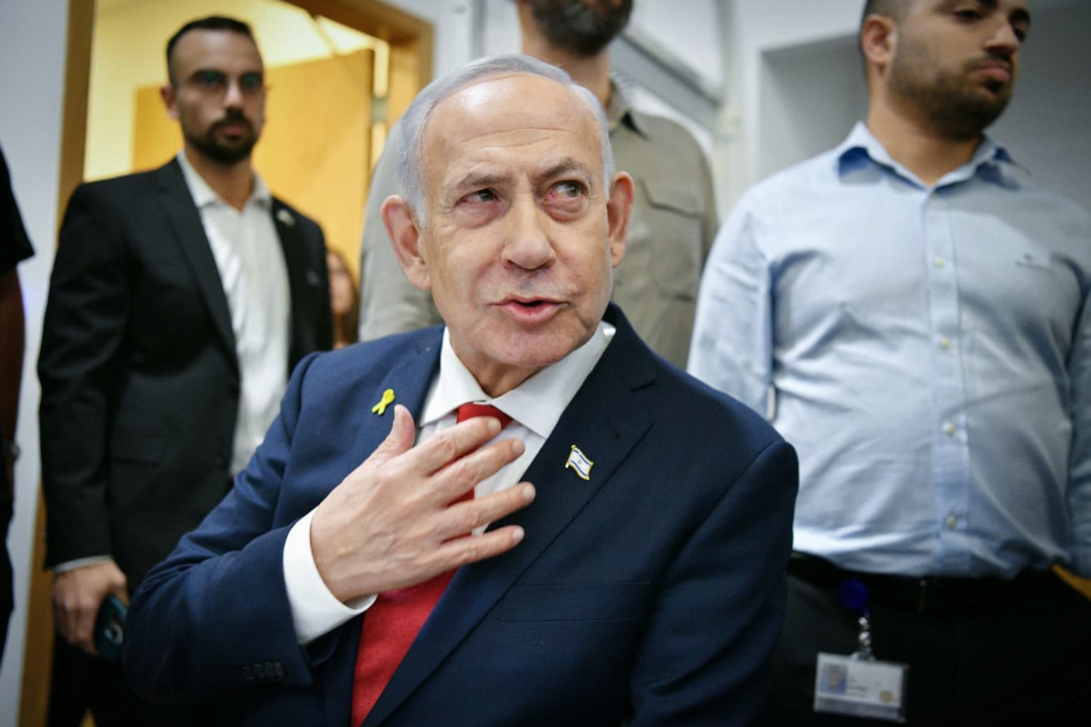 Prime Minister Benjamin Netanyahu arrives to the courtroom at the District Court in Tel Aviv, in the trial against him, October 15, 2025 (photo credit: REUVEN KASTRO/POOL)