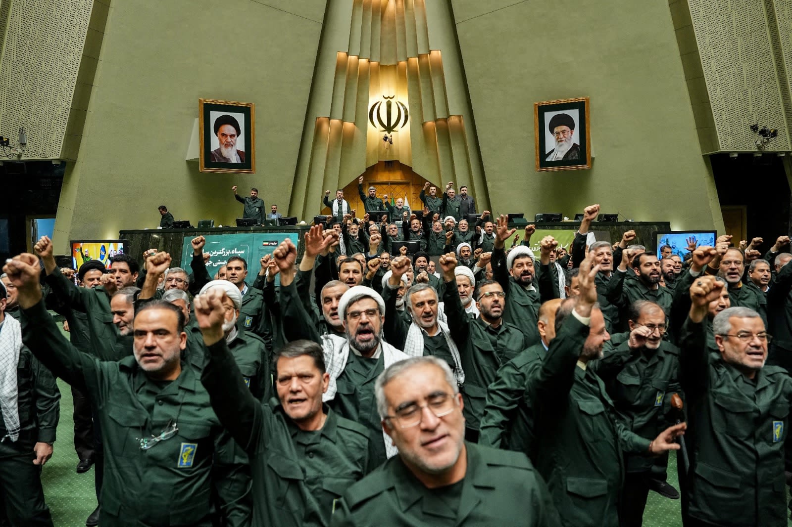 Iranian parliament members chant in support of the IRGC while wearing military uniforms in Tehran, Iran, February 1, 2026. (photo credit: Hamed Malekpour/Islamic consultative assembly news agency/WANA (West Asia News Agency)/Handout via )