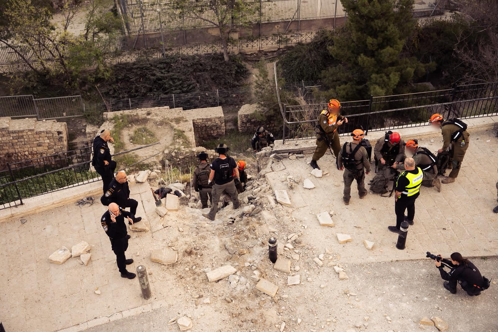 IDF Home Front Command forces in an impact site in Jerusalem (photo credit: IDF SPOKESPERSON UNIT)