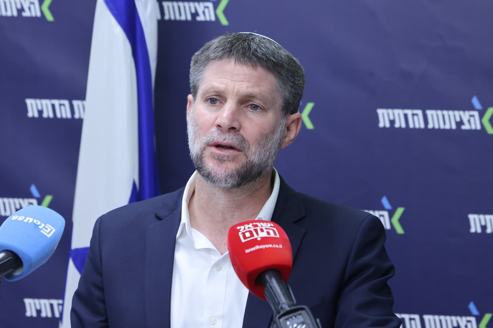 Bezalel Smotrich speaks to the press on March 23, 2026. (photo credit: MARC ISRAEL SELLEM)