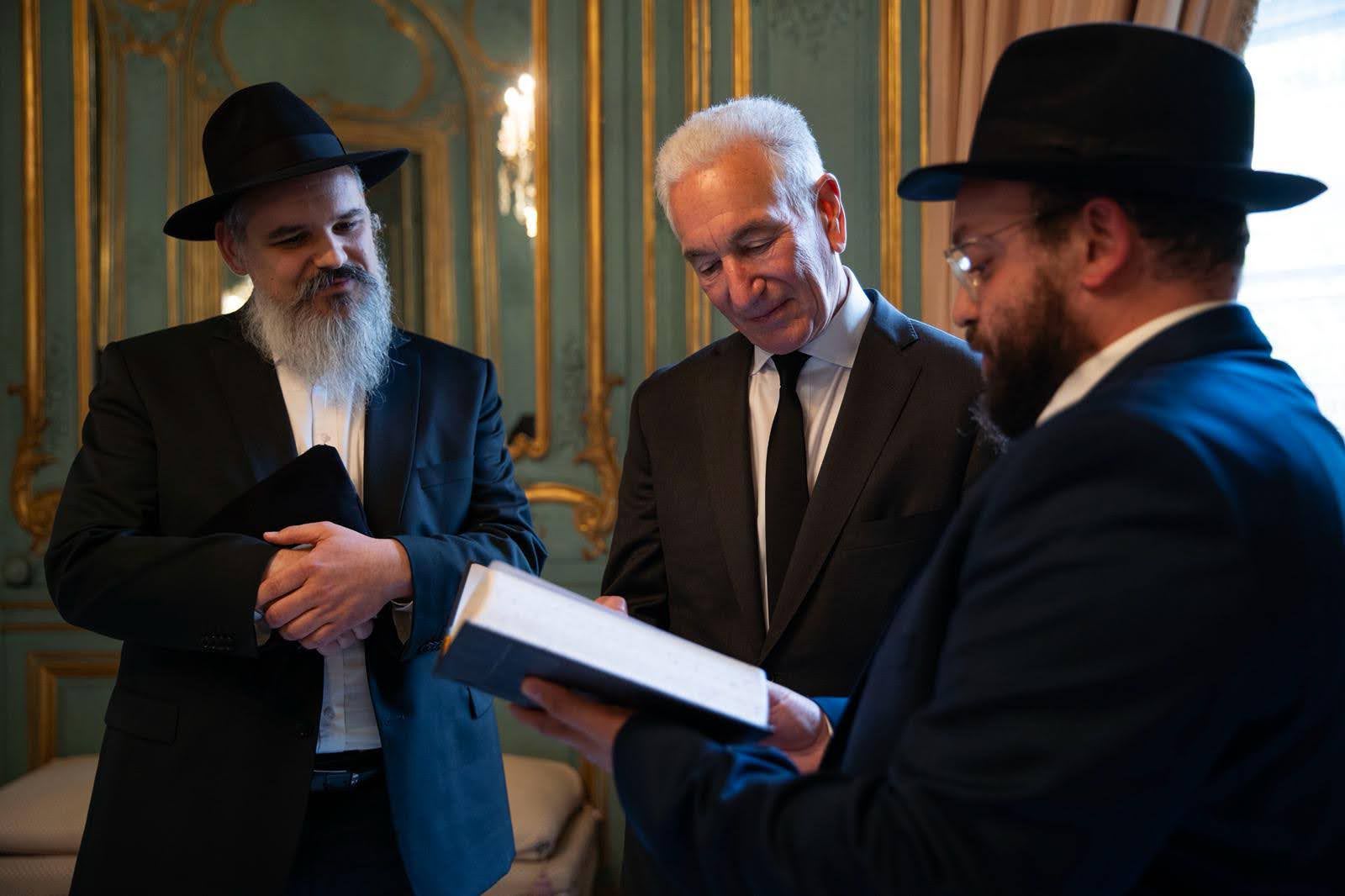 US Ambassador to France Charles Kushner stands with two members of Chabbad in his Paris residence. (photo credit: US Embassy in France)