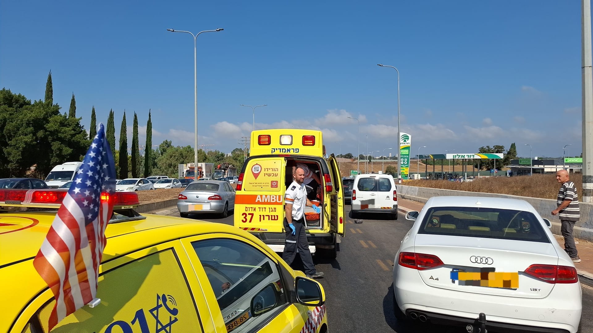 The site of a reported car ramming in Kfar Yona, Magen David Adom and police forces arriving at the scene, July 24, 2025. (photo credit: MAGEN DAVID ADOM)