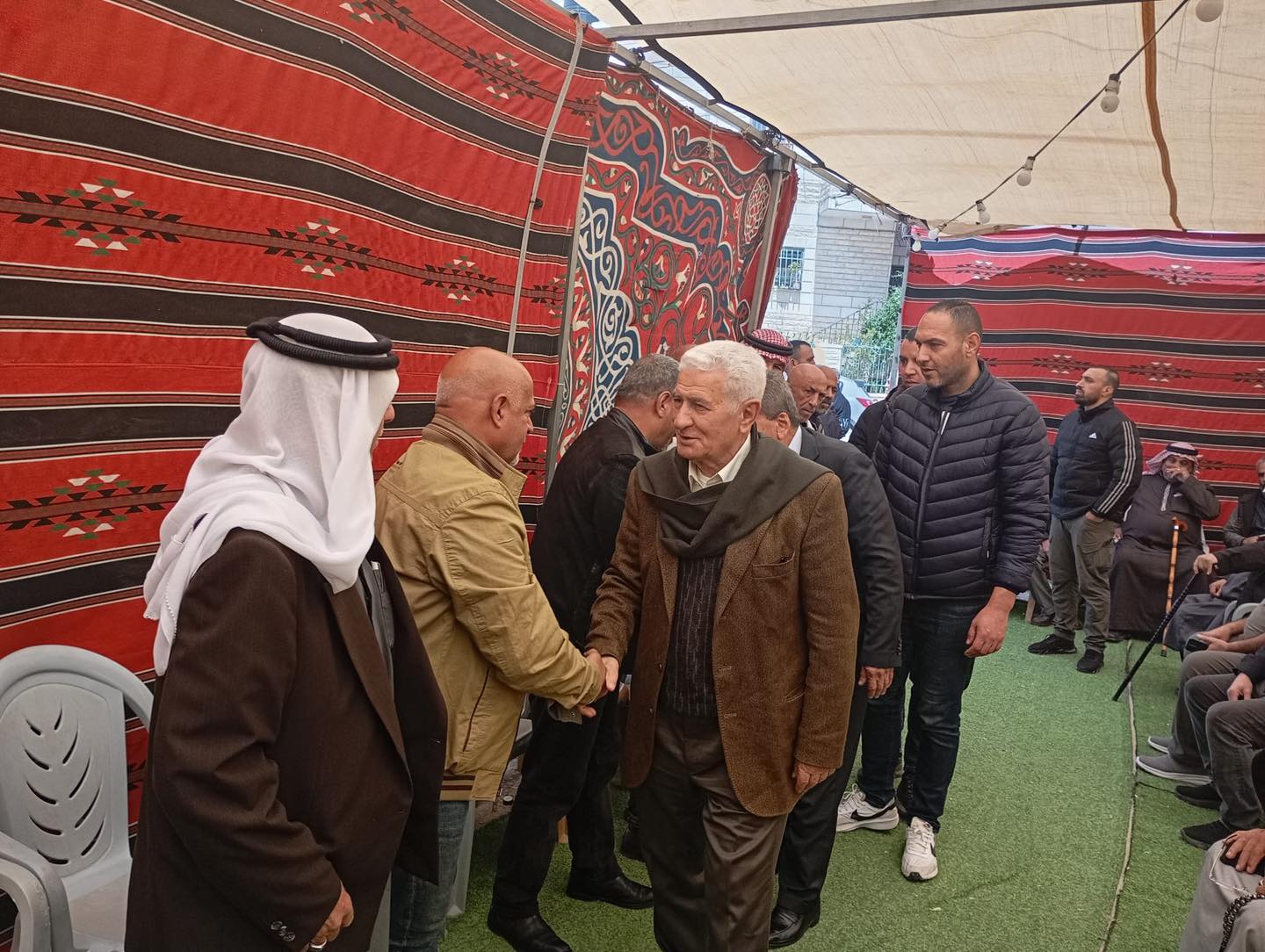 Officials gather in the mourning tent for Palestinian terrorist Riyad Al-Amour in early April 2026. (photo credit: ABBAS ZAKI VIA FACEBOOK)