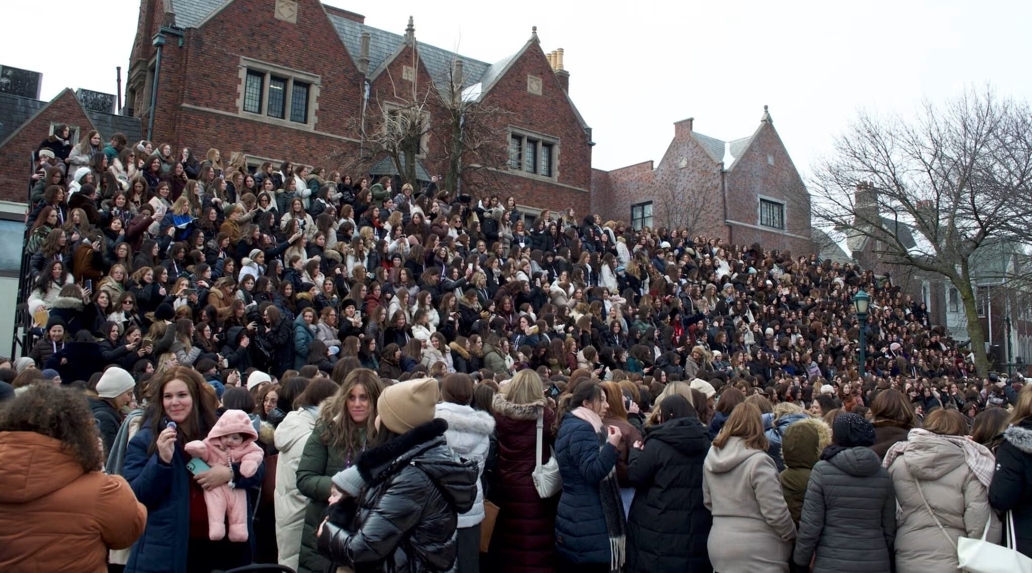 Female emissaries of the Chabad-Lubavitch movement gather for a group photo in Crown Heights, Brooklyn, on Feb. 6, 2026. (photo credit: Jewish Telegraphic Agency)