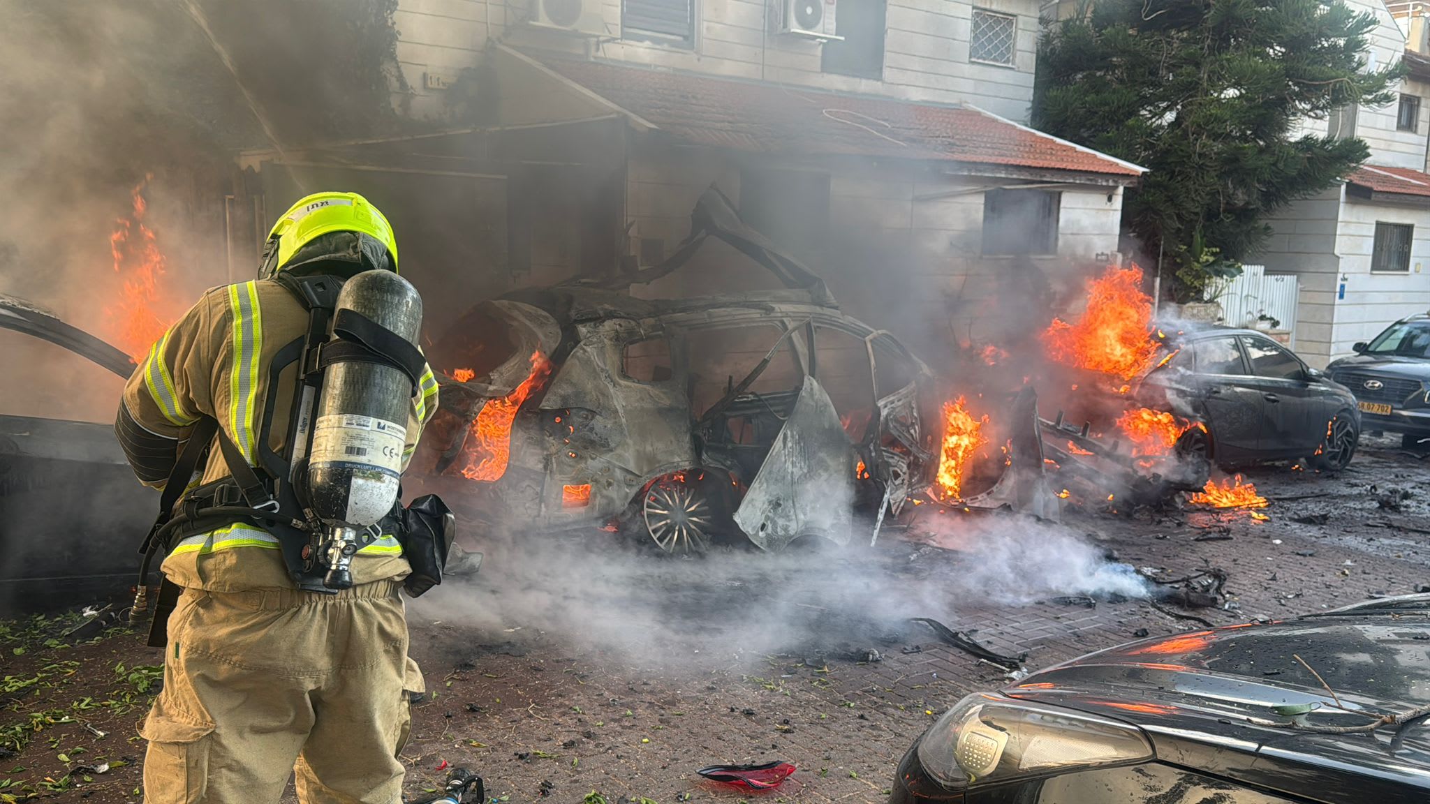 Fire and Rescue Services at the scene of a direct hit in central Israel, February 28, 2026. (photo credit: FIRE AND RESCUE SERVICE)
