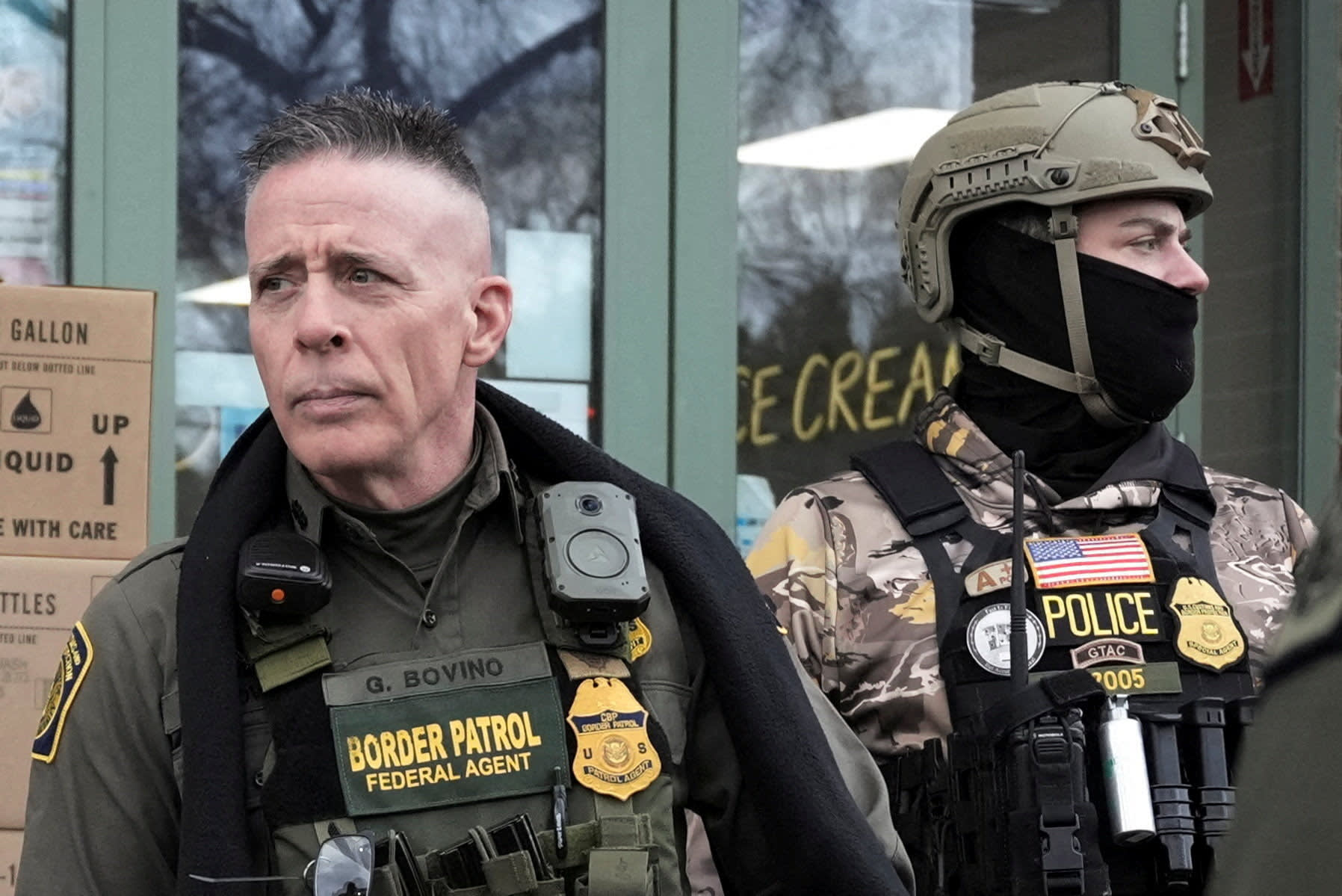 Border Patrol commander Greg Bovino looks on as he and his convoy stop at a gas station, days after an ICE agent fatally shot Renee Nicole Good in Minneapolis, in Columbia Heights, Minnesota, US, January 13, 2026. (photo credit: REUTERS/Tim Evans/File Photo)