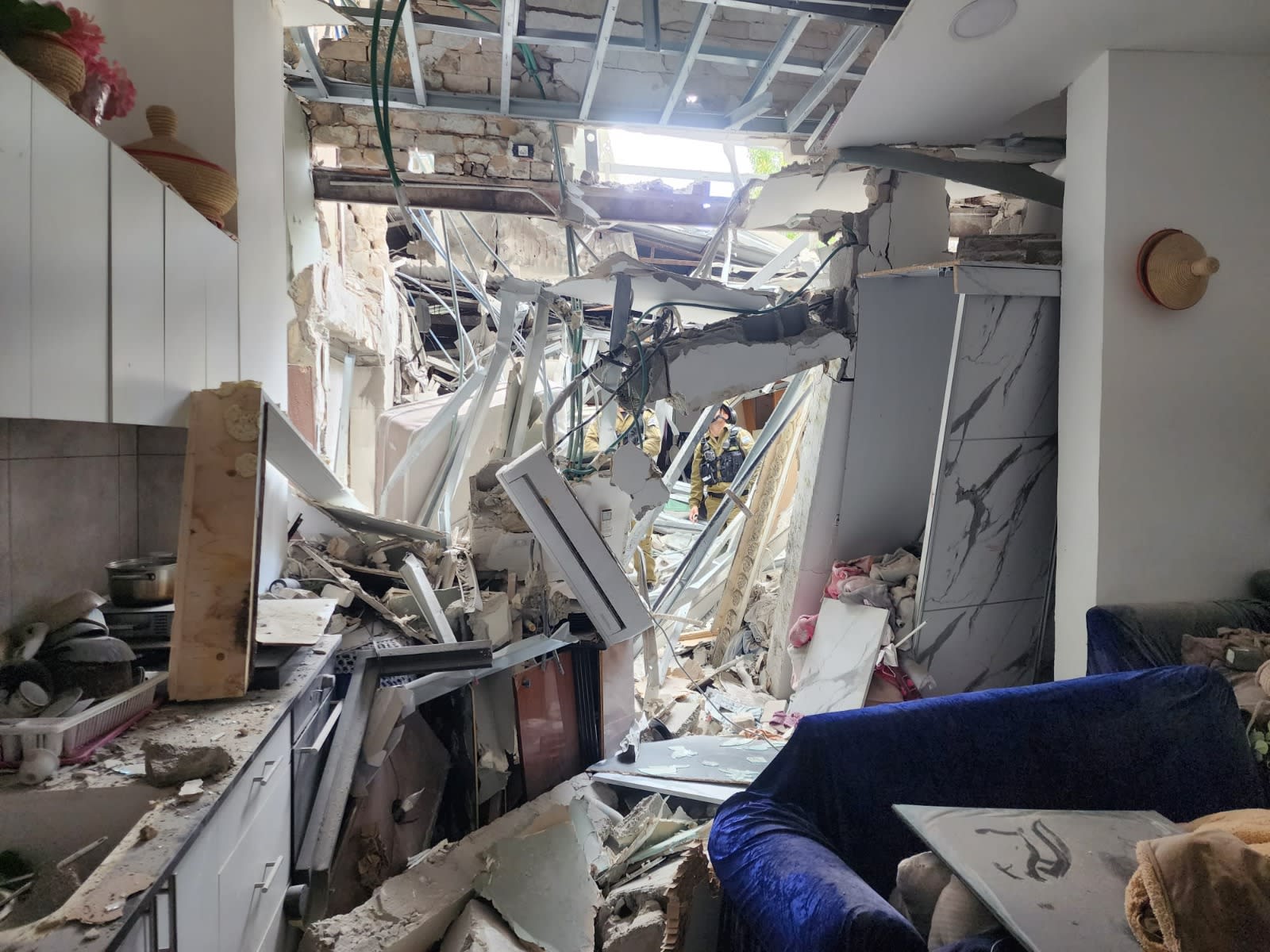 Damage after Iranian missile fragments hit a residence in the Tel Aviv area, March 26, 2026. (photo credit: ISRAEL POLICE)