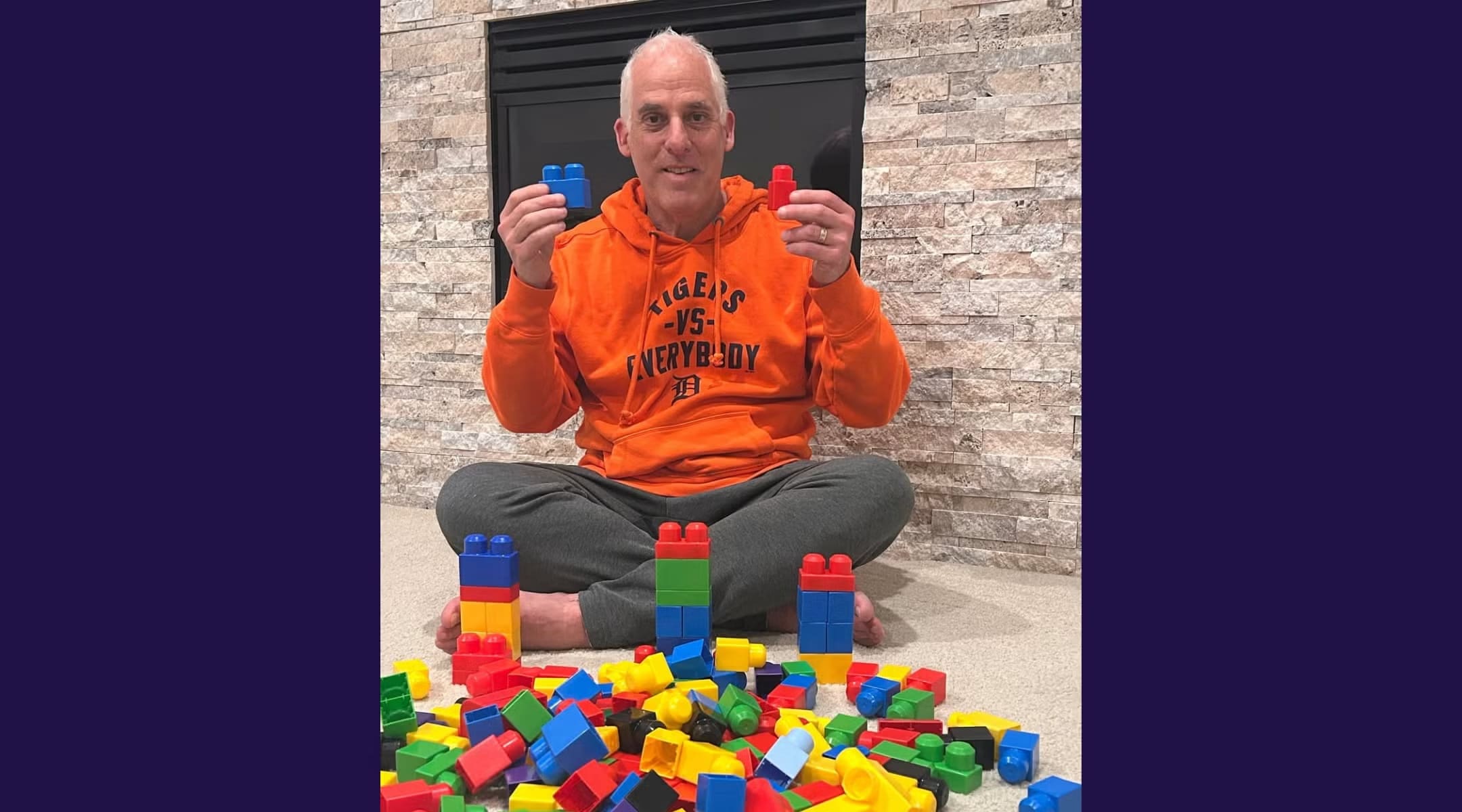 Rabbi Josh Bennett of Temple Israel in Detroit holds Lego blocks, urging families to add the children’s toy to their Seder plates in the wake of a recent attack on the synagogue.  (photo credit: FACEBOOK/JTA)