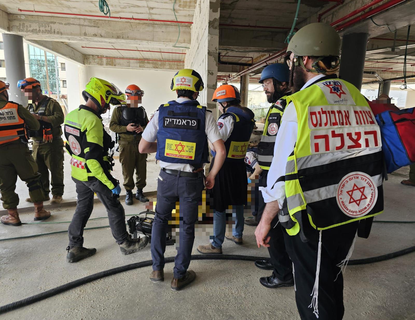 Magen David Adom paramedics at the scene of a missile hit, March 9, 2026. (photo credit: MAGEN DAVID ADOM)