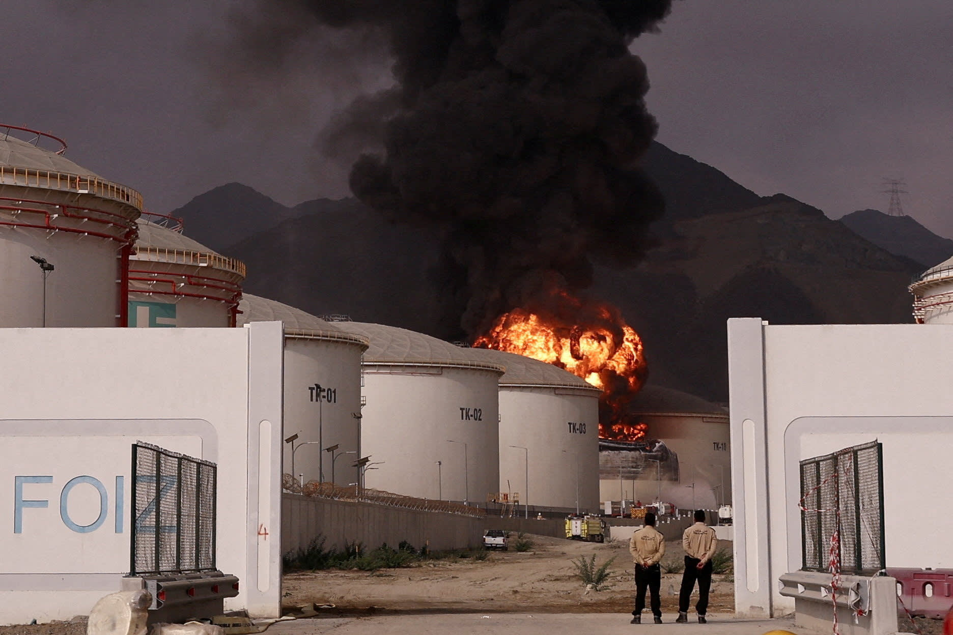 Fire and smoke rise in the Fujairah Oil Industry Zone, caused by debris after interception of a drone by air defenses, UAE, March 4, 2026; illustrative. (photo credit: REUTERS/Amr Alfiky TPX IMAGES OF THE DAY)