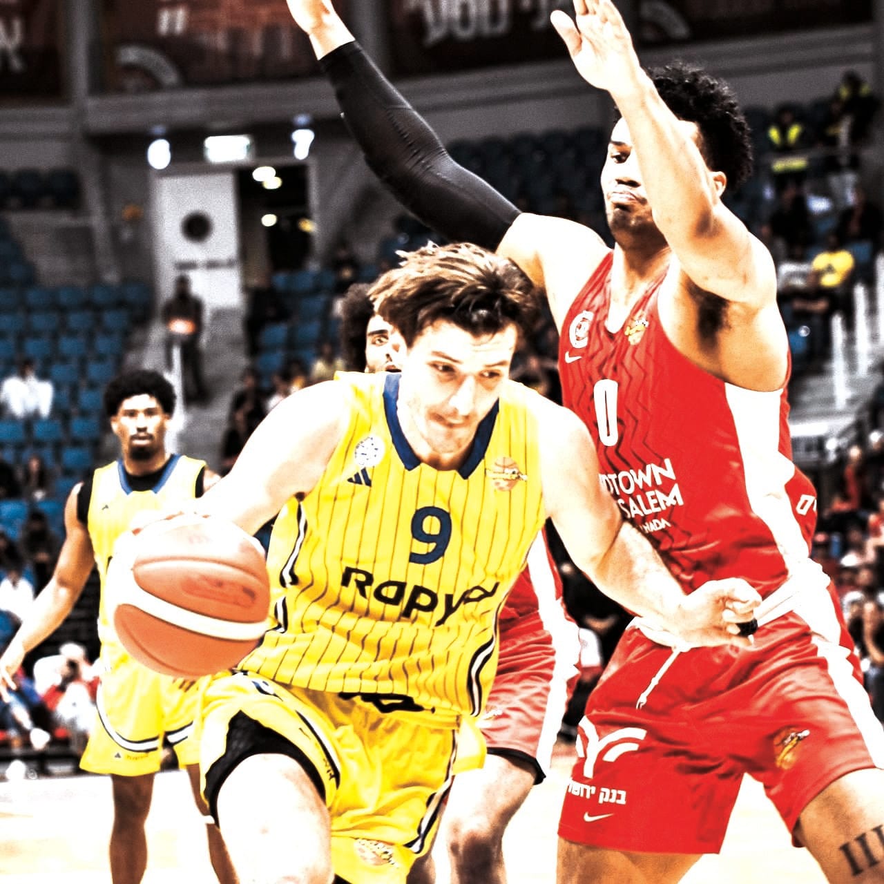ROMAN SORKIN (9) was quiet early vs Hapoel Jerusalem, but made a big impact for Maccabi Tel Aviv late in the fourth quarter and overtime of its 112-105 road victory. (photo credit: YEHUDA HALICKMAN)