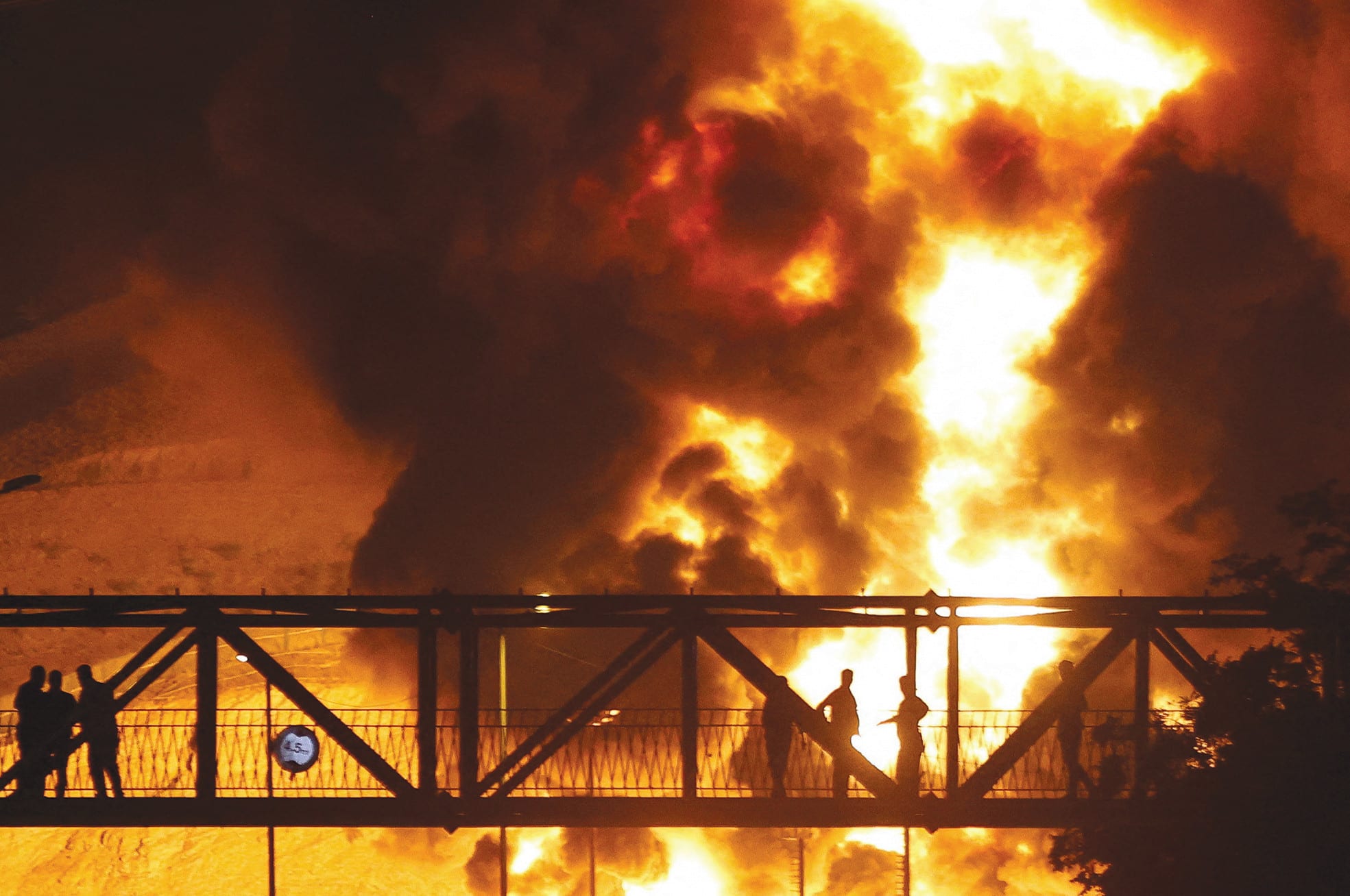  ISRAELI strikes damage the Shahran depot near Tehran last month. It held a large portion of the capital region’s refined fuel reserves, says the writer.   (photo credit: WEST ASIA NEWS AGENCY/REUTERS)