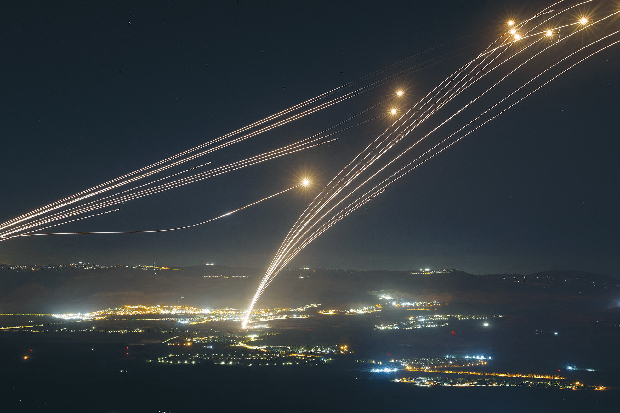  A fundamental key to the success of Israel’s air defense lies in the multilayered defense system that many countries around the world are trying to copy. Here, rockets fired by Hezbollah are intercepted by the Iron Dome air defense system over the Upper Galilee last August. (photo credit: JALAA MAREY/AFP VIA GETTY IMAGES)