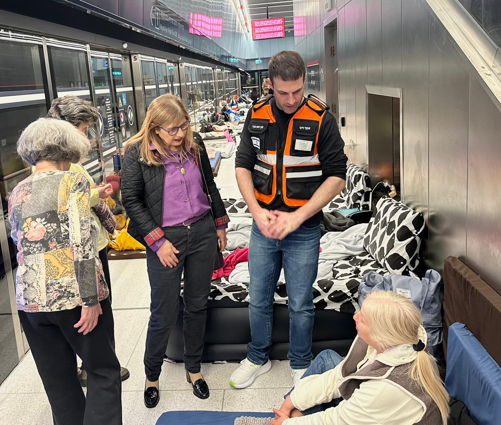 Assaf Weiss and Enda Vidal visiting citizens in the underground light rail in Ramat Gan. (photo credit: Omri Bram)