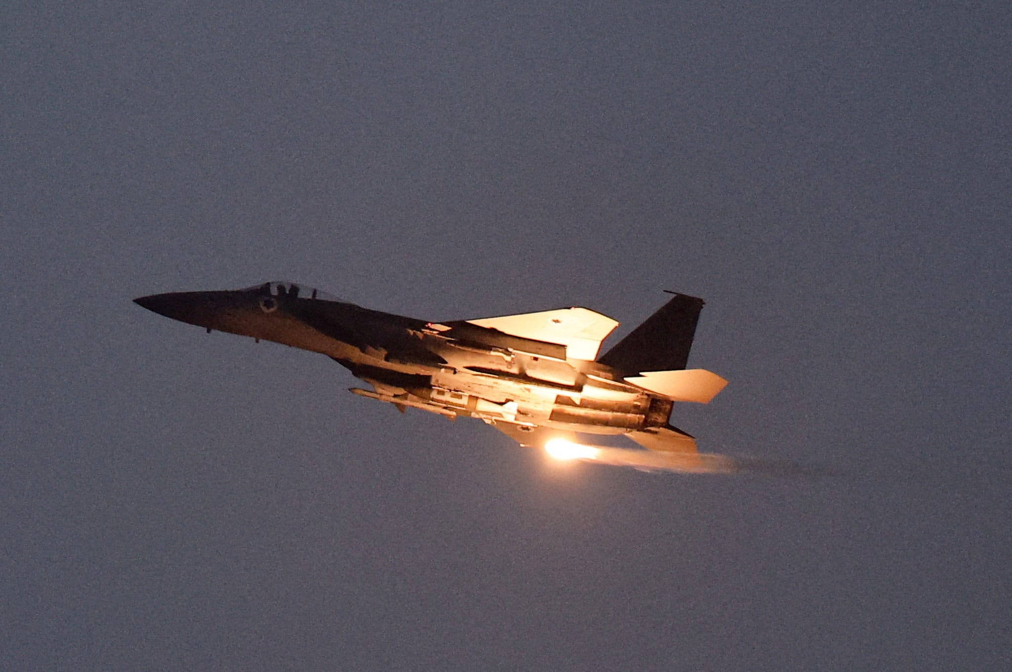An Israeli F-15 jet releases a flare as it flies over Gaza, August 18, 2025 (Illustrative). (photo credit: REUTERS/AMIR COHEN)