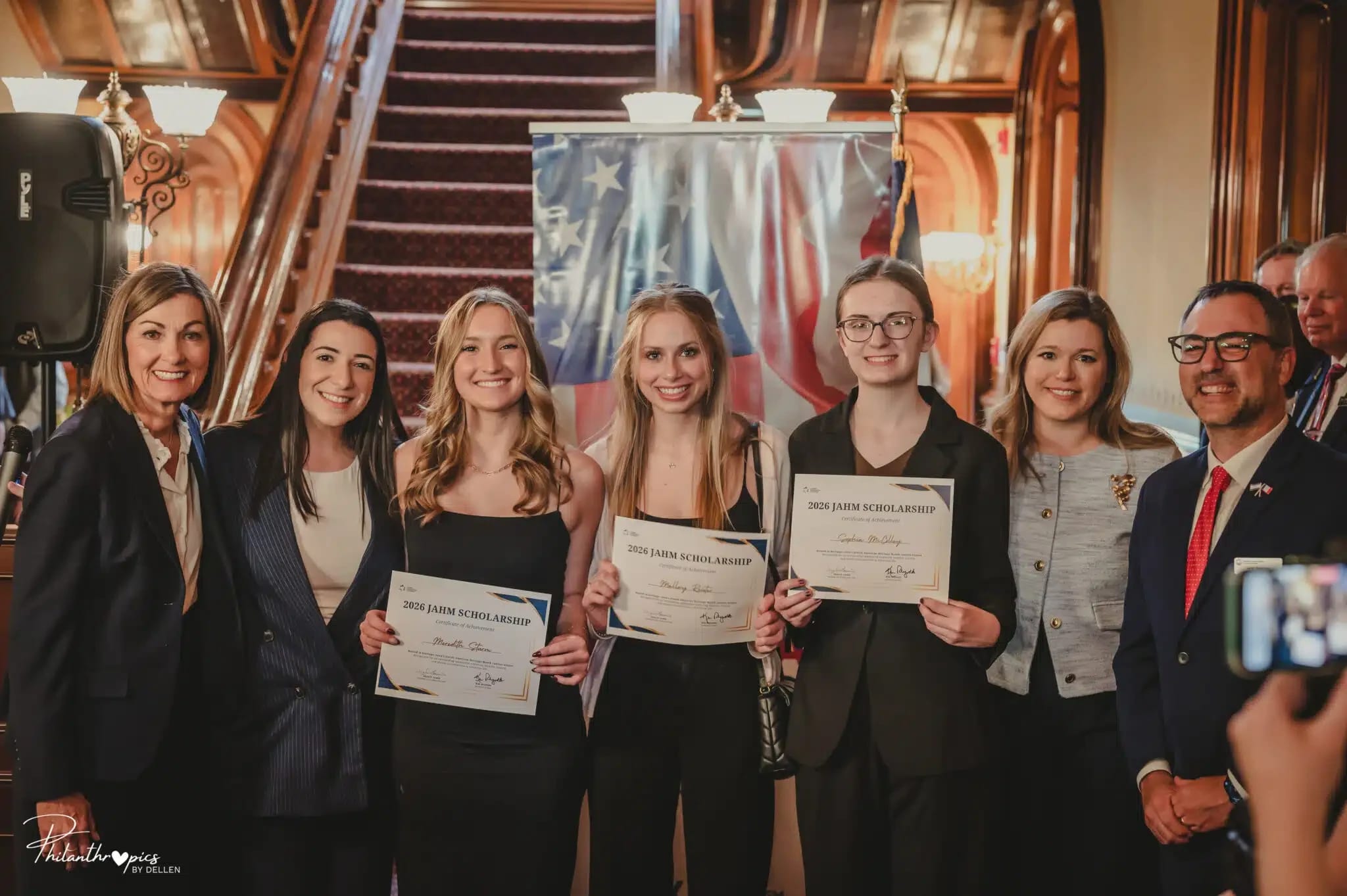 Iowa Gov. Kim Reynolds, CAM Jewish American Heritage Project Dir. Lenore Zach, Iowa JAHM Scholarship winners, Dir. of the Iowa Dept. of Education Mackenzie Snow, & Exec. Dir. of the Jewish Federation of Greater Des Moines Jarad Bernstein.  (photo credit: Dellen Burk-Flores)