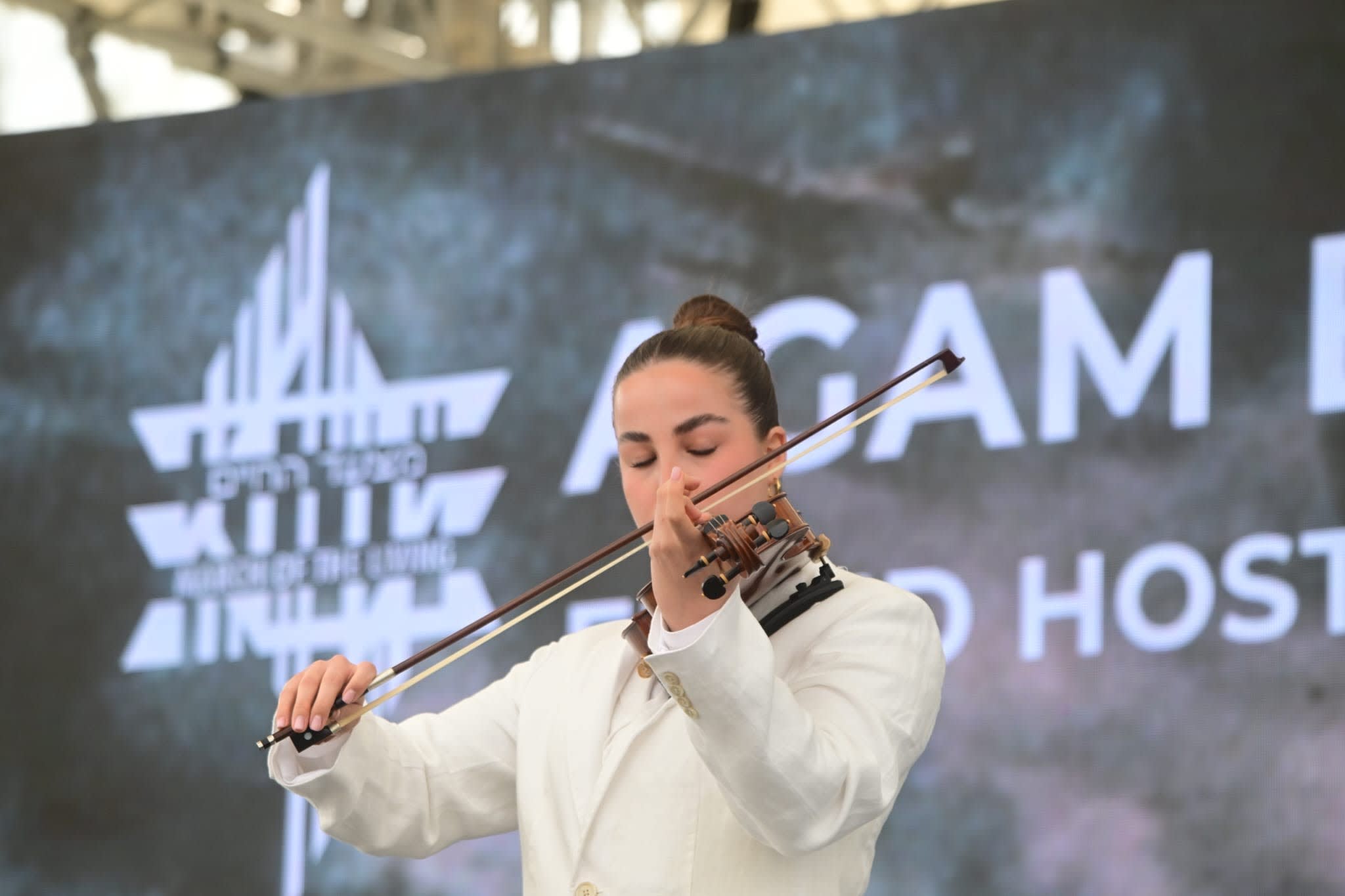 Agam Berger at March of the Living ceremony 2026. (photo credit: YOSSI ZELIGER)